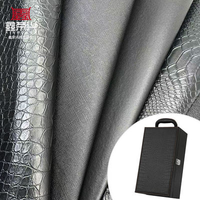 थोक पीवीसी फॉक्स लेदर वॉलेट बॉक्स जूते नोटबुक लीची एनिमल बुना हुआ क्रॉस पैटर्न आर्टिफिशियल सिंथेटिक लेदर फैब्रिक