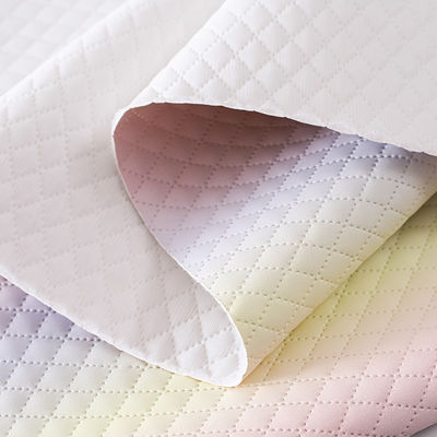 इम्बोस्ड हैंडबैग पीयू चमड़े के कपड़े ग्रैडिएंट इंद्रधनुष हीरा ग्रिड की बनावट