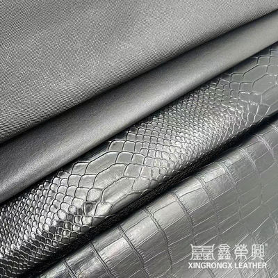 थोक पीवीसी फॉक्स लेदर वॉलेट बॉक्स जूते नोटबुक लीची एनिमल बुना हुआ क्रॉस पैटर्न आर्टिफिशियल सिंथेटिक लेदर फैब्रिक